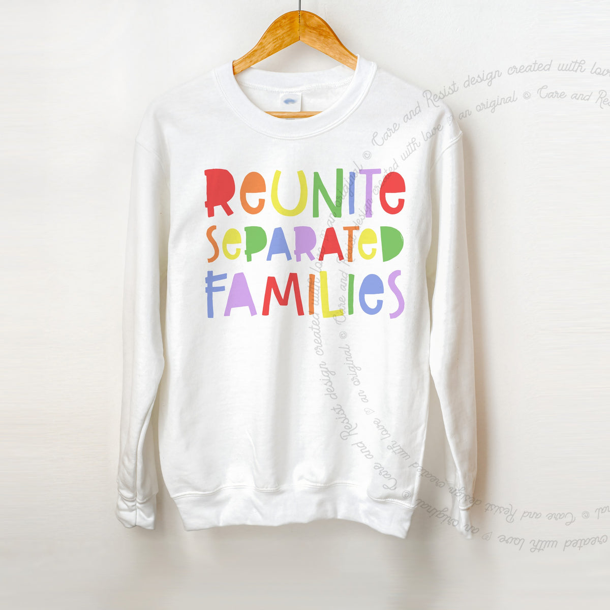 Reunite Separated Families Care & Resist Gildan crewneck sweatshirt in White