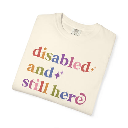 Disabled and Still Here Care & Resist rainbow Comfort Colors tee