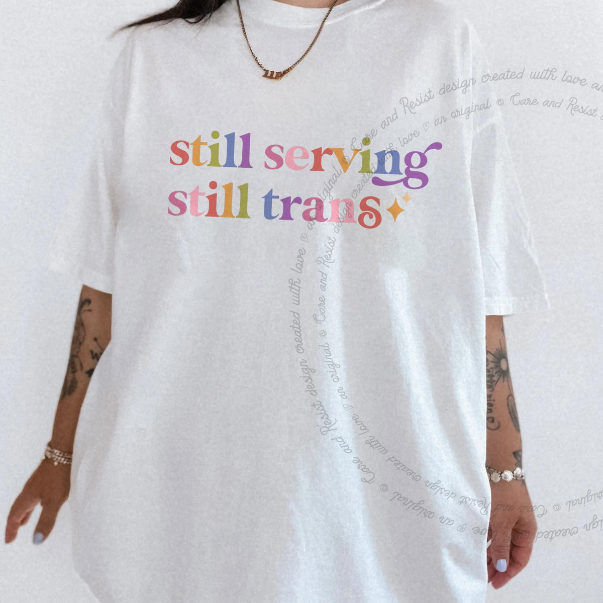 Still Serving Still Trans Care & Resist rainbow tee