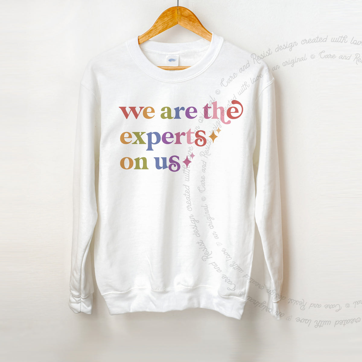 We are the Experts on Us Care & Resist Gildan crewneck sweatshirt in White