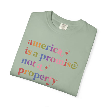 America is a Promise not a Property Care & Resist rainbow Comfort Colors tee