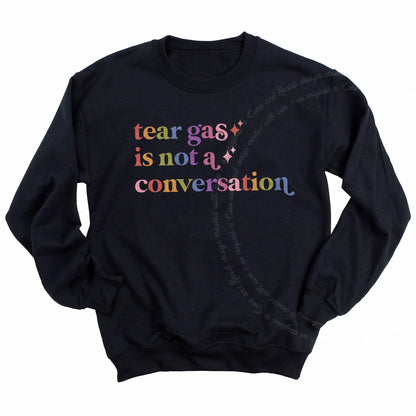 Tear Gas is not a Conversation Care & Resist Gildan crewneck sweatshirt in Black