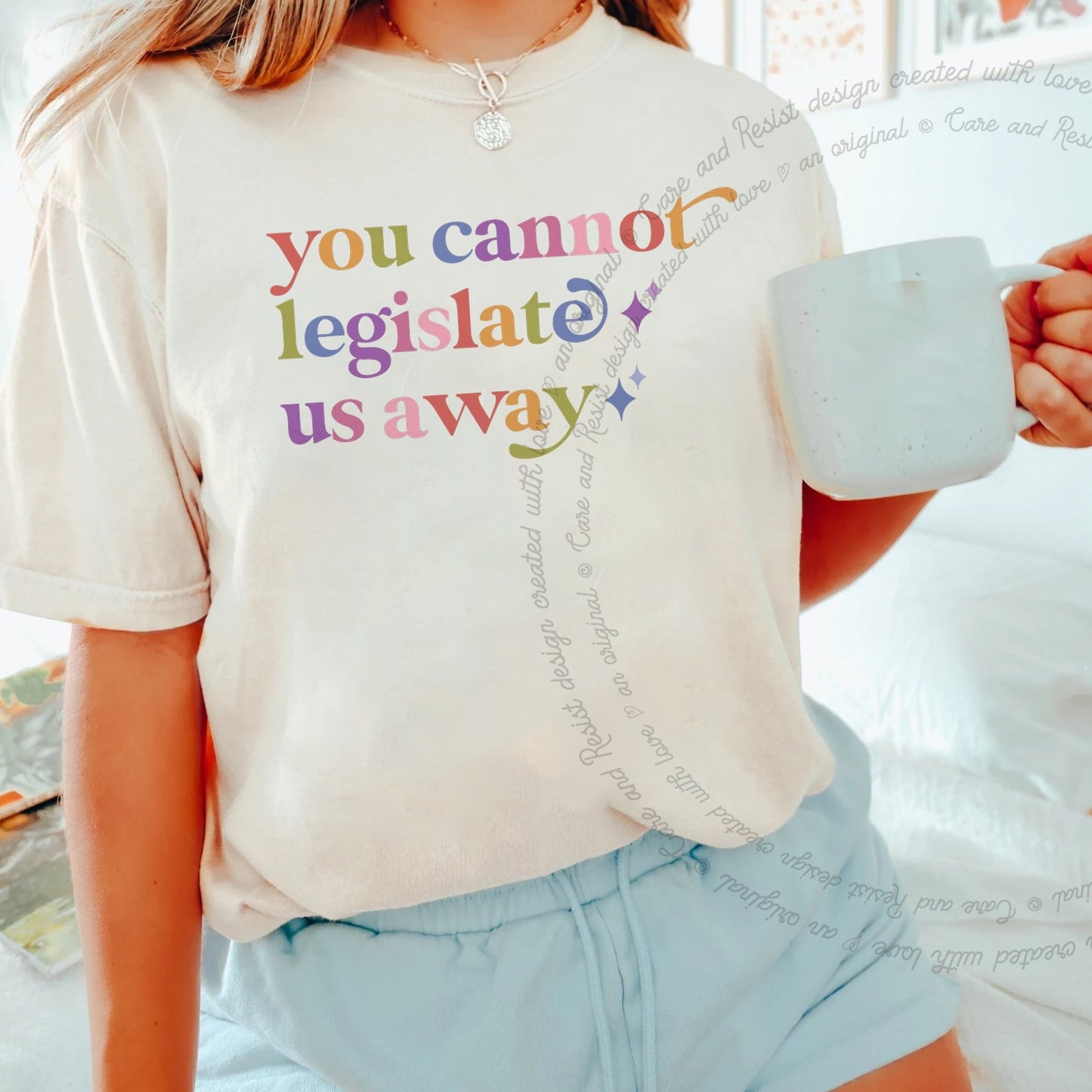 You Cannot Legislate Us Away Care & Resist rainbow Comfort Colors tee, Ivory