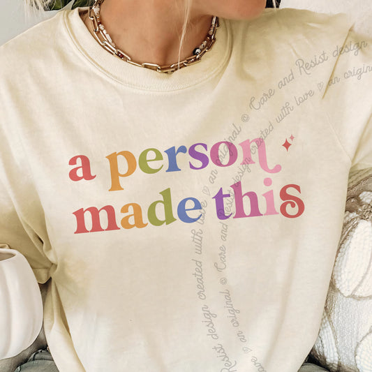 A Person Made This Care & Resist progressive t-shirt in Ivory