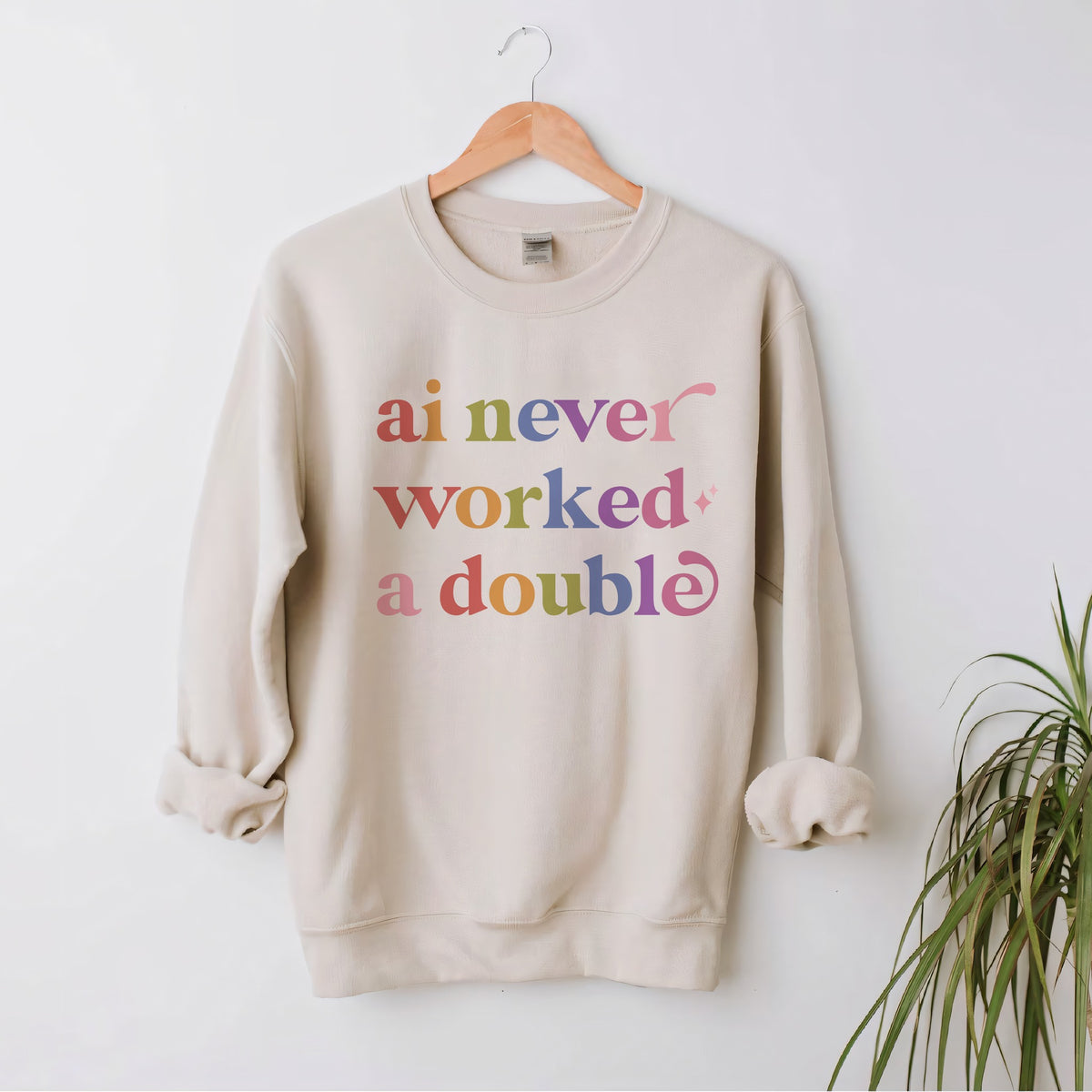 Ai Never Worked a Double Care & Resist Gildan crewneck sweatshirt in Sand