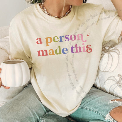 A Person Made This Care & Resist rainbow Comfort Colors tee, Ivory