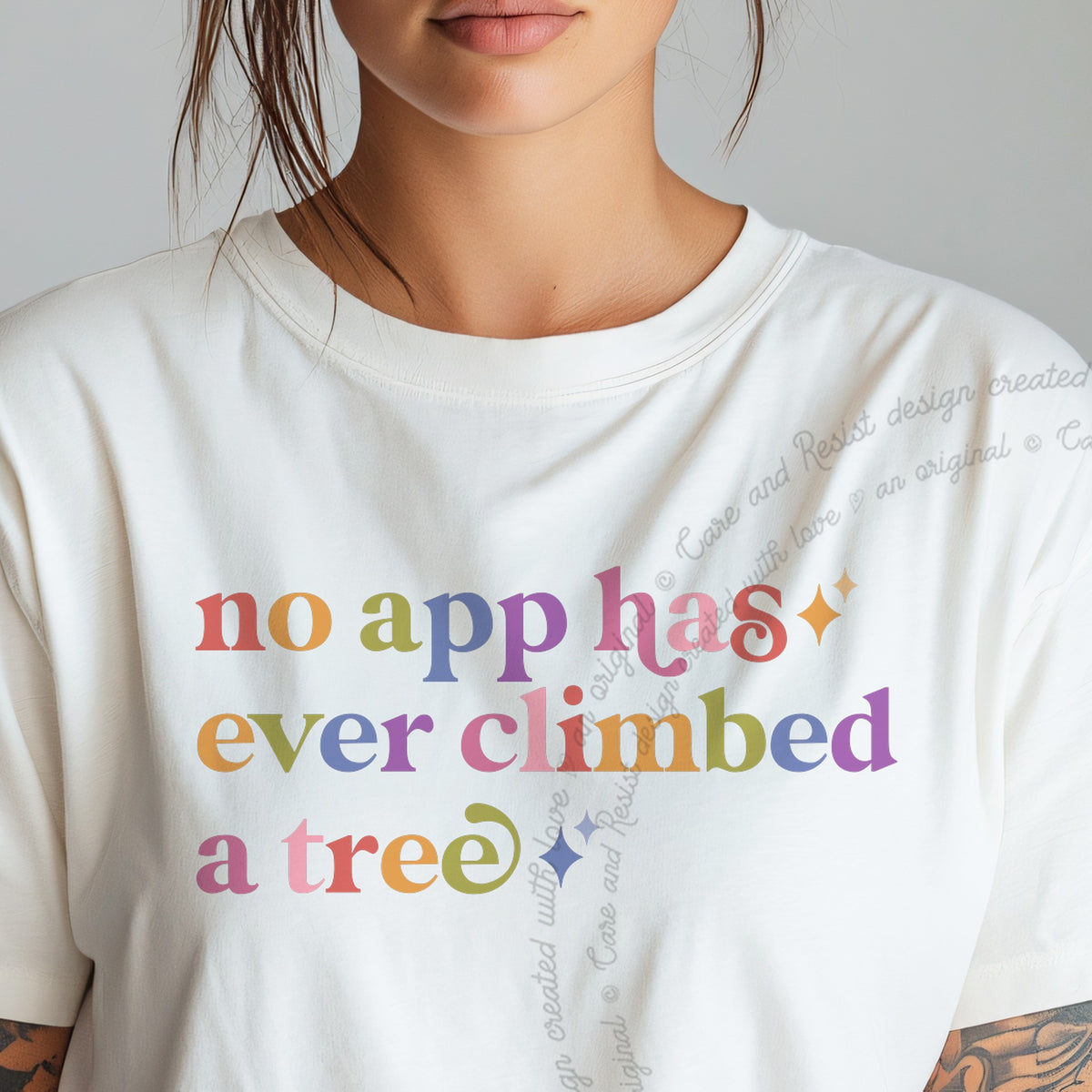 No App Has Ever Climbed a Tree Care & Resist tee in White, close-up of the lettering