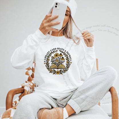 A Library Card Beats a Paywall Badge Care & Resist Gildan crewneck sweatshirt in White