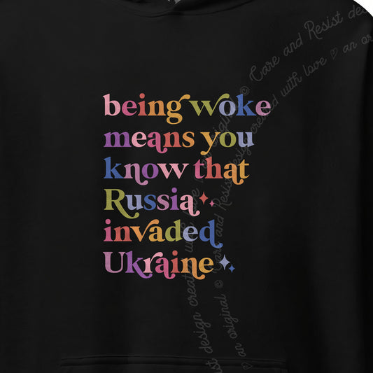 Being Woke Means You Know That Russia Invaded Ukraine Care & Resist Gildan hoodie in Black