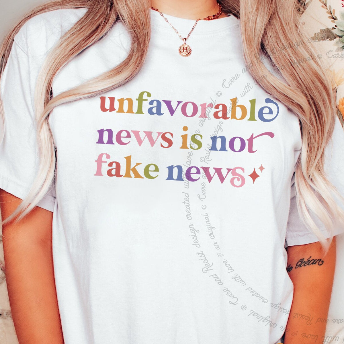 Unfavorable News is not Fake News Care & Resist progressive t-shirt in White