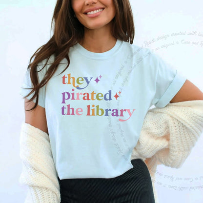 They Pirated the Library Care & Resist rainbow tee