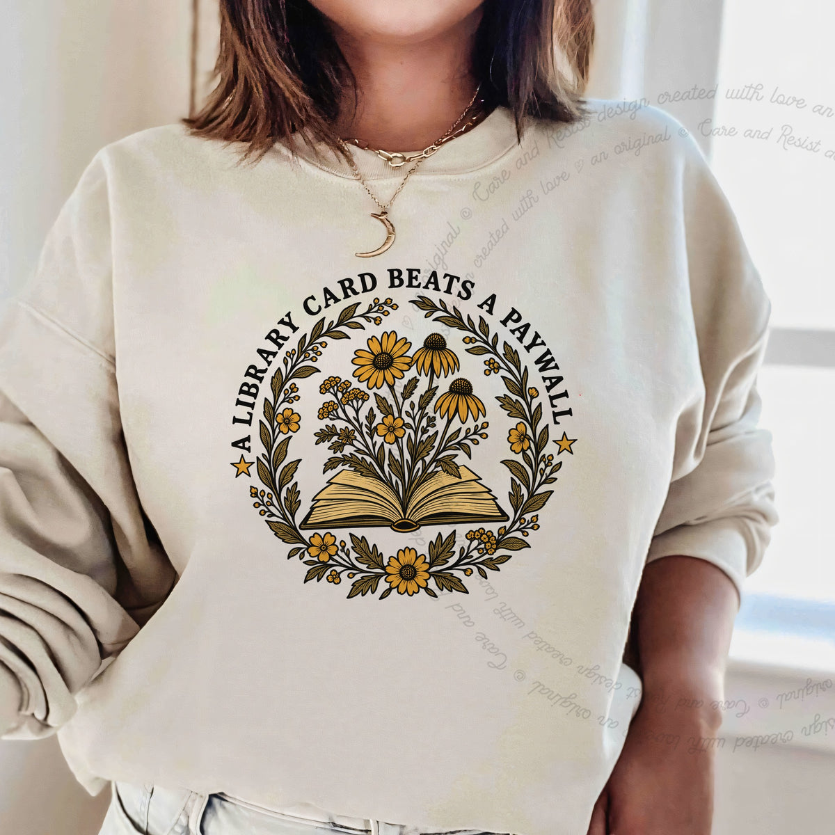 A Library Card Beats a Paywall Badge Care & Resist Gildan crewneck sweatshirt in Sand