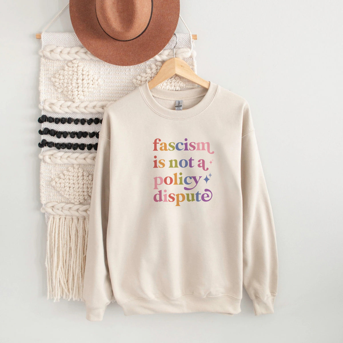 Fascism is not a Policy Dispute Care & Resist Gildan crewneck sweatshirt in Sand