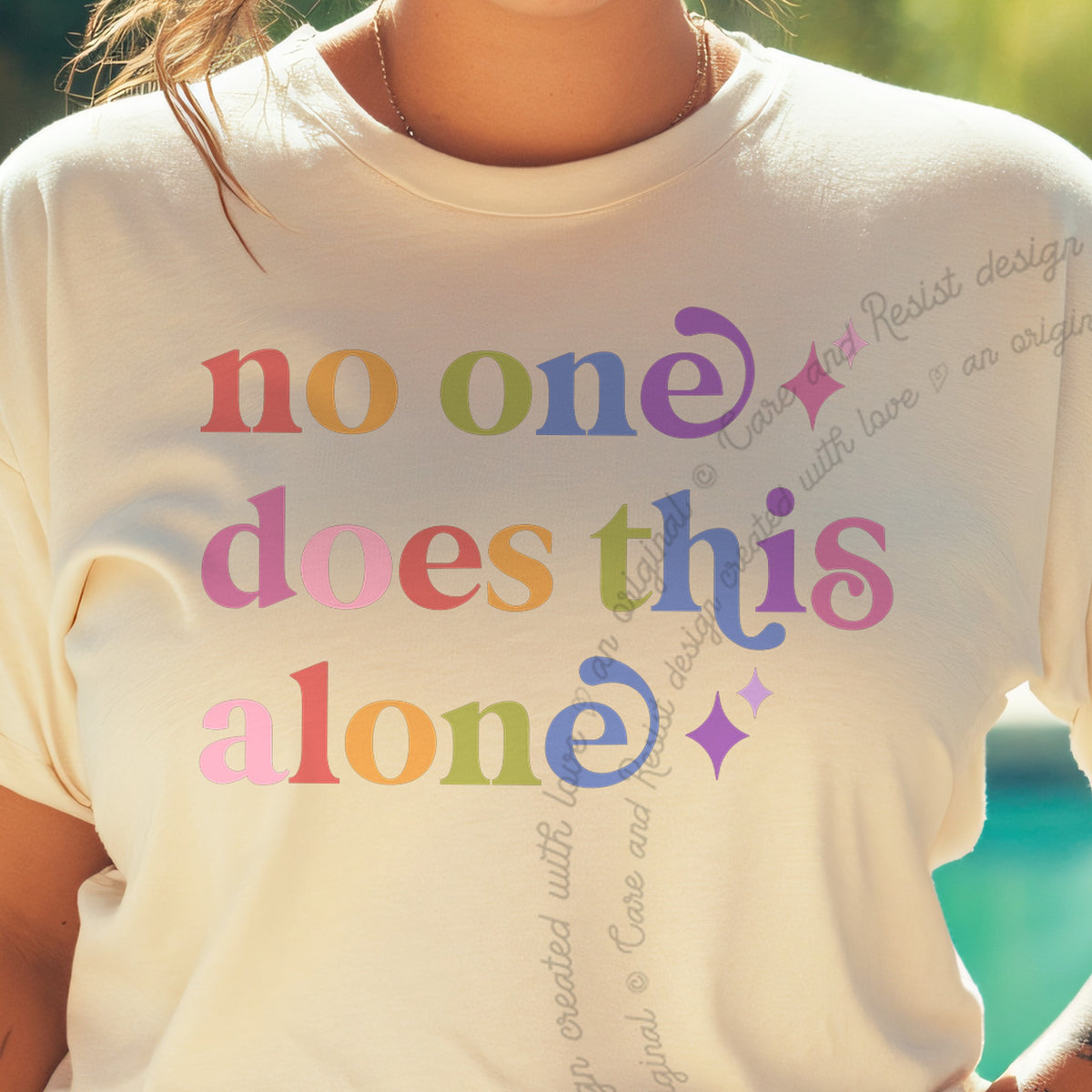 No One Does This Alone Care & Resist progressive t-shirt in Ivory