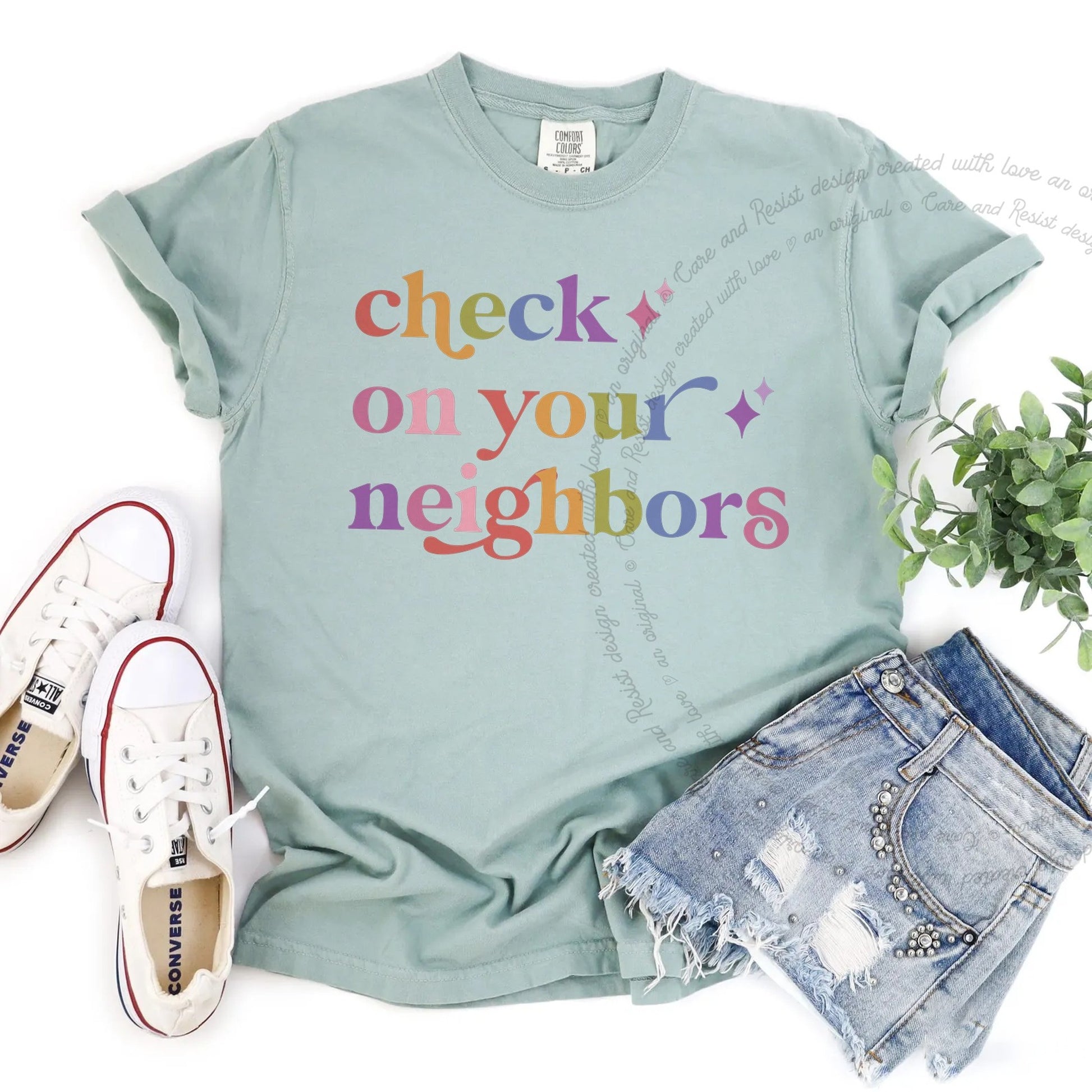 Check on Your Neighbors Care & Resist rainbow Comfort Colors tee, Bay