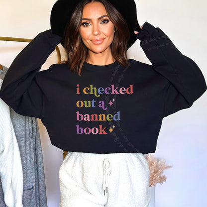 I Checked Out a Banned Book Care & Resist Gildan crewneck sweatshirt in Black
