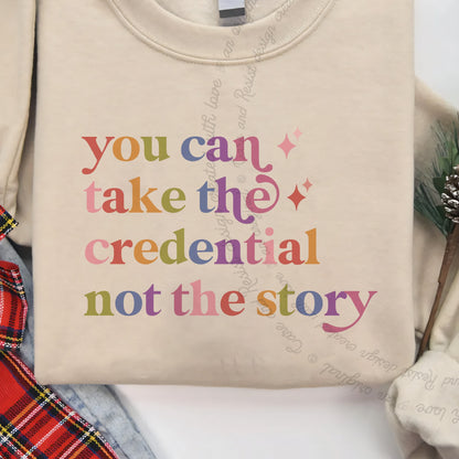 You Can Take the Credential not the Story Care & Resist Gildan crewneck sweatshirt in Sand