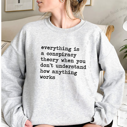 Everything Is a Conspiracy Theory When You Don't Understand How Anything Works Care & Resist Gildan crewneck sweatshirt in Sport Grey