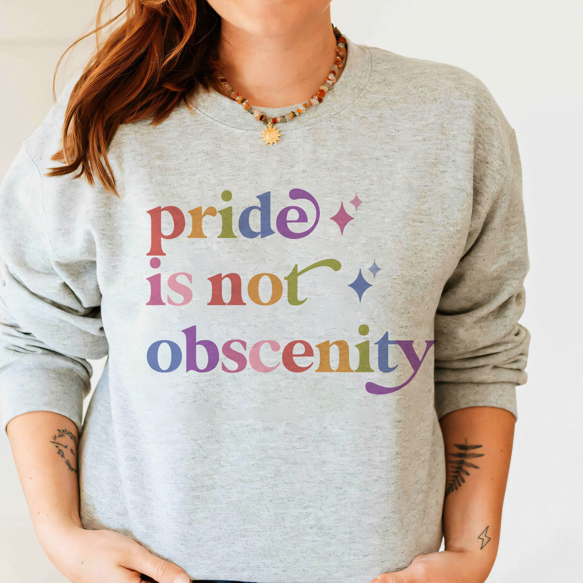 Pride is not Obscenity Care & Resist Gildan crewneck sweatshirt in Sport Grey