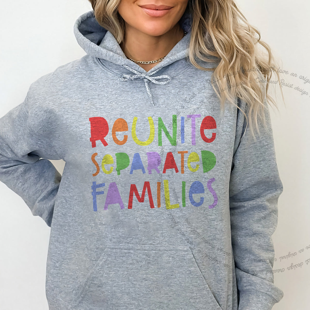 Reunite Separated Families Care & Resist Gildan hoodie in Sport Grey