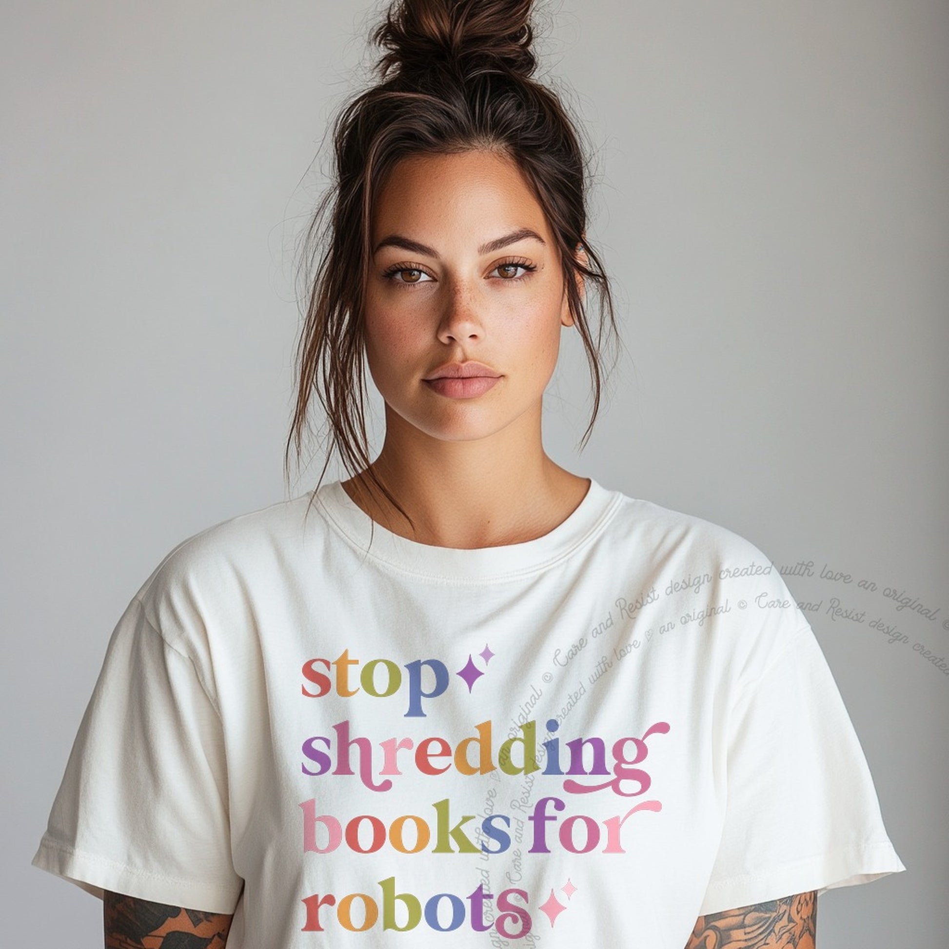 Stop Shredding Books for Robots Care & Resist rainbow tee