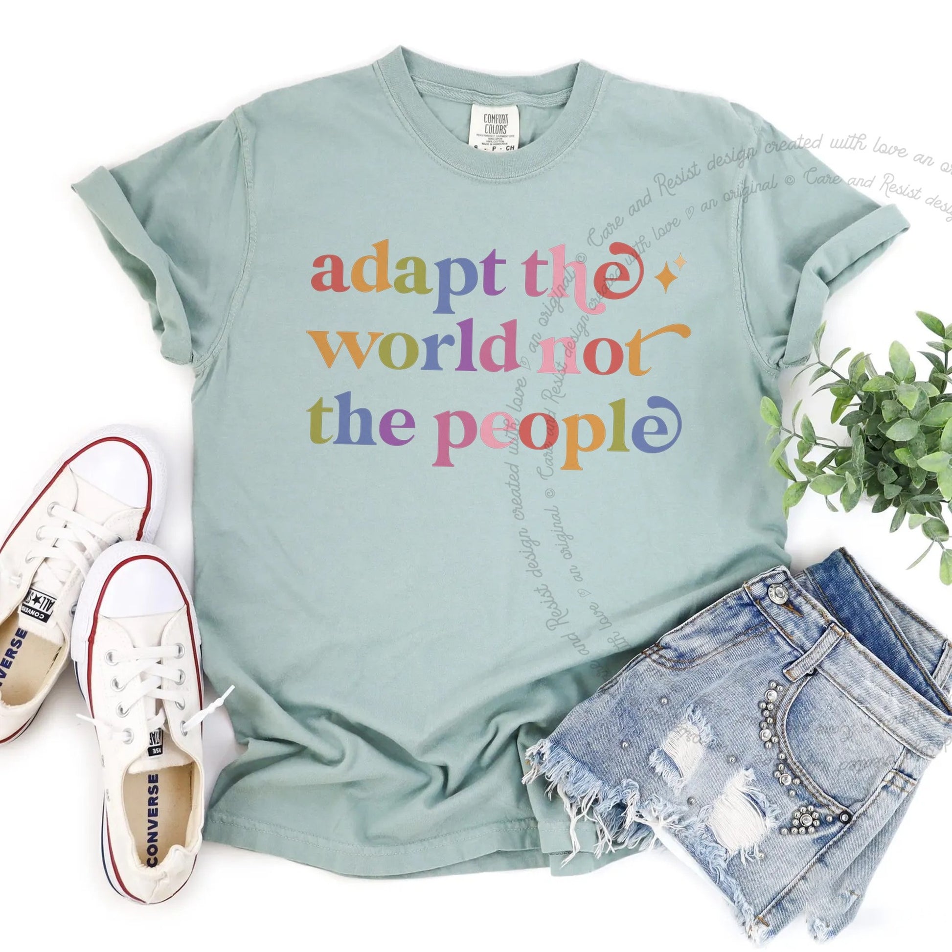 Adapt the World not the People Care & Resist rainbow tee