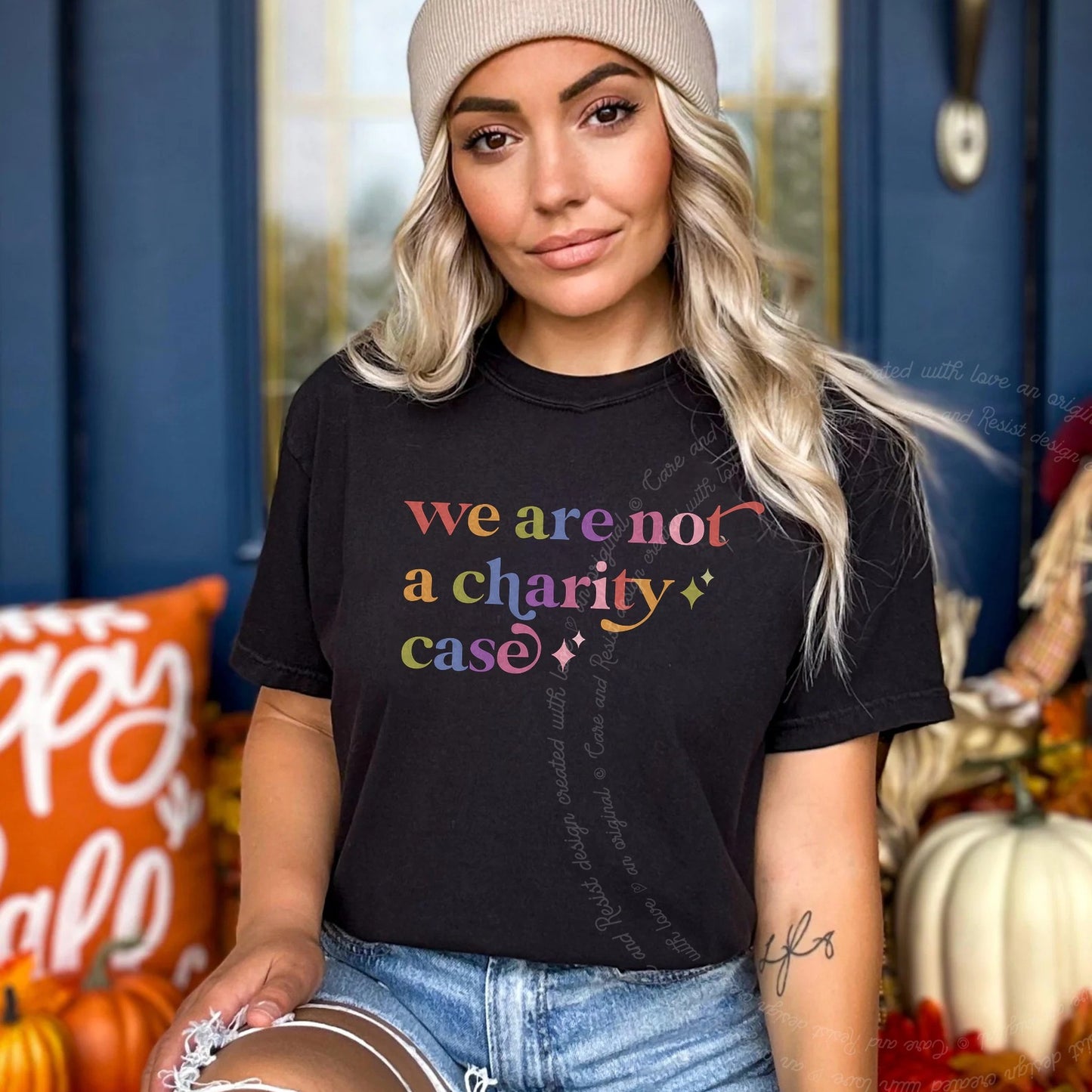 We are not a Charity Case Care & Resist rainbow tee