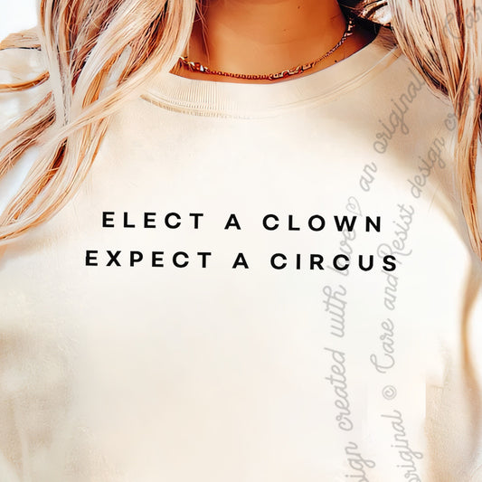 Elect a Clown Expect a Circus Care & Resist progressive t-shirt in Ivory