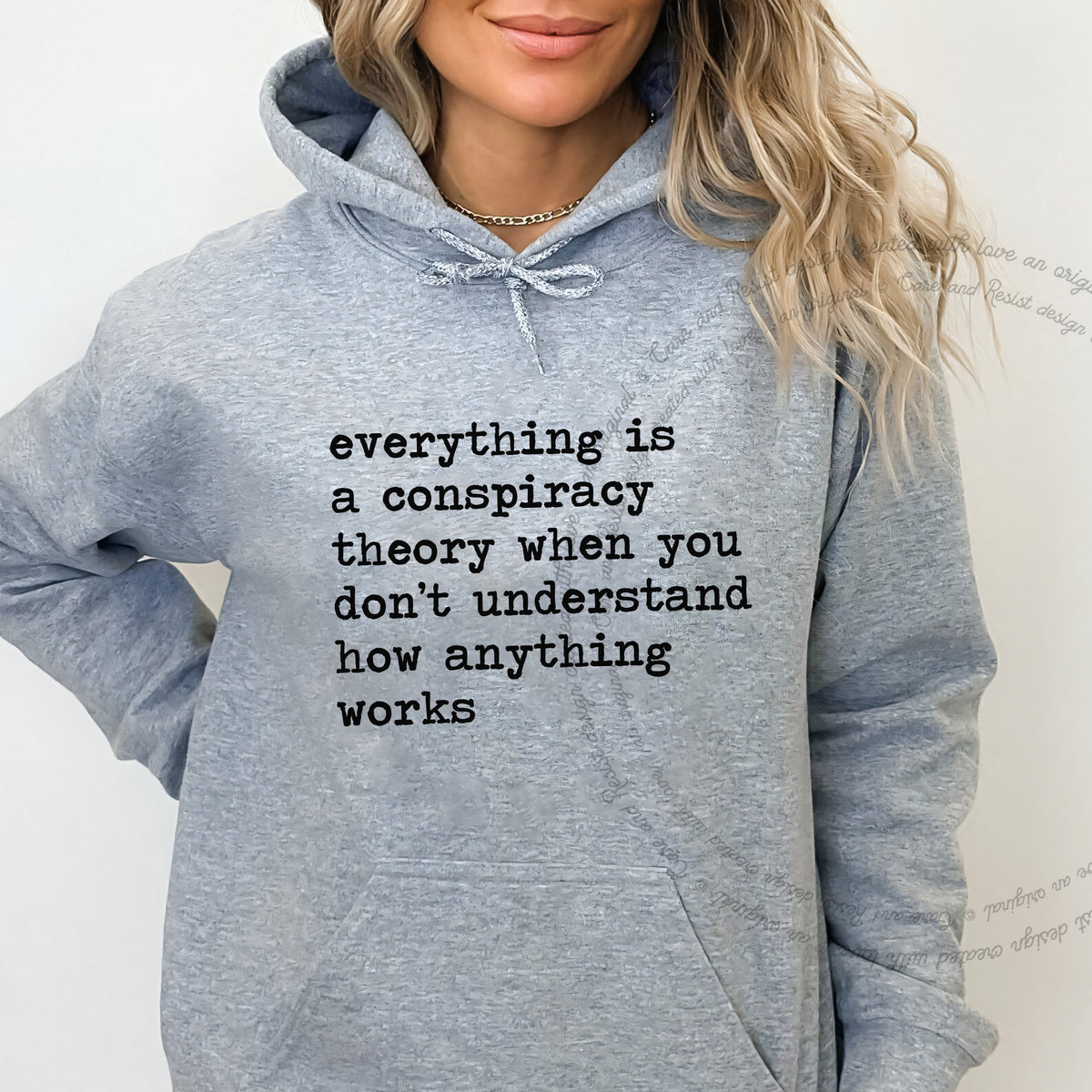 Everything Is a Conspiracy Theory When You Don't Understand How Anything Works Care & Resist Gildan hoodie in Sport Grey