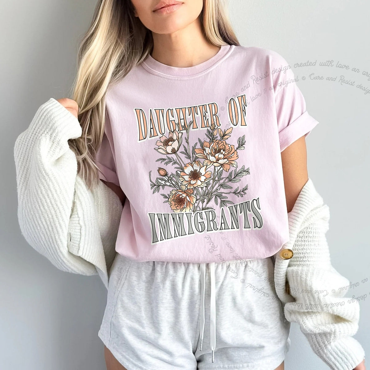 Daughter of Immigrants Care & Resist progressive t-shirt in Blossom