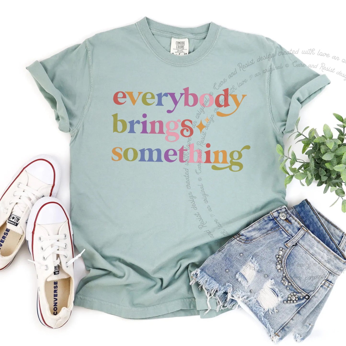 Everybody Brings Something Care & Resist rainbow tee