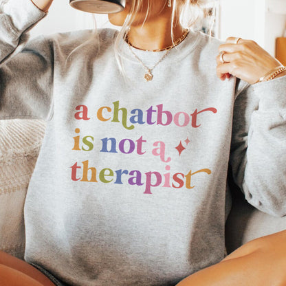 A Chatbot is not a Therapist Care & Resist Gildan crewneck sweatshirt in Sport Grey