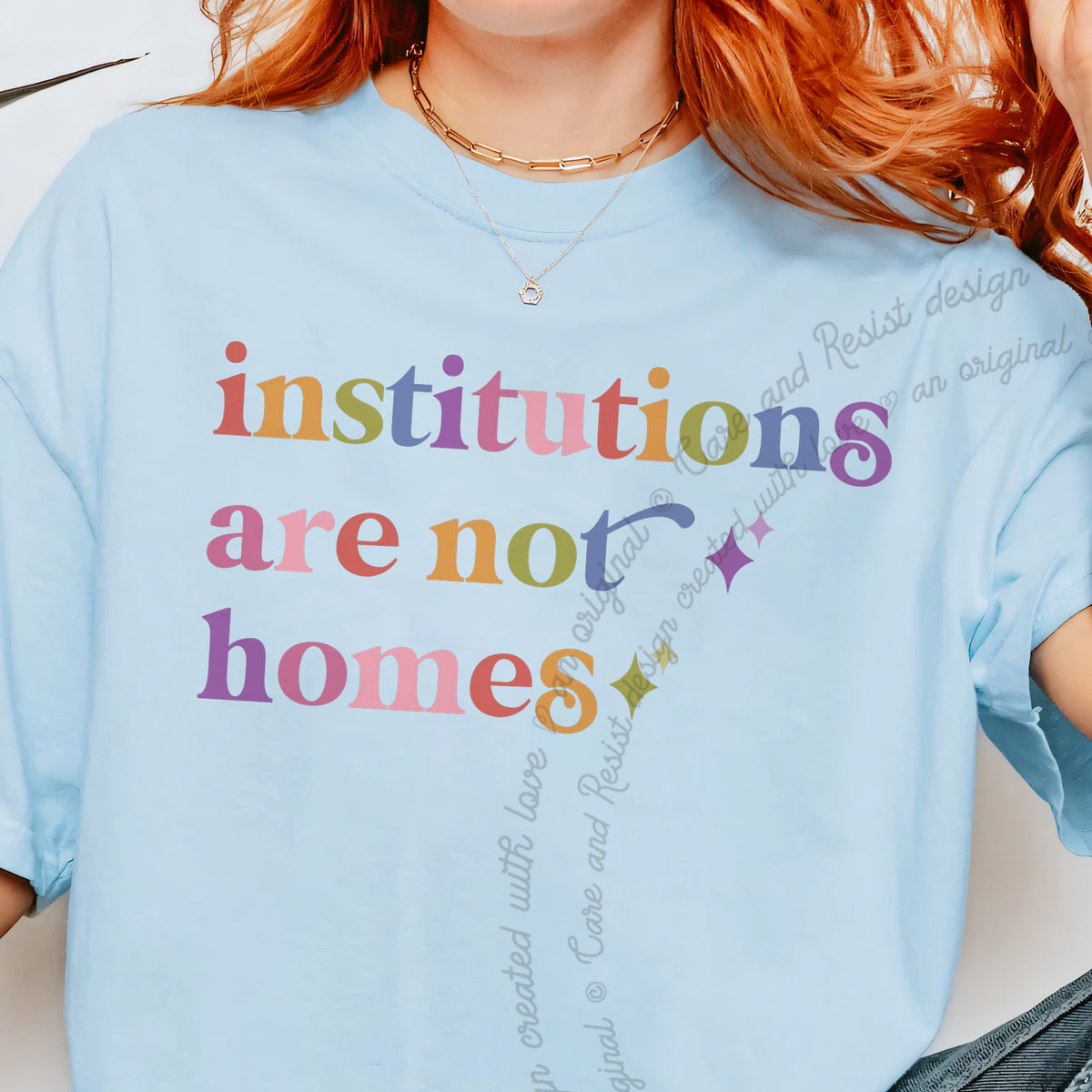 Institutions are not Homes Care & Resist progressive t-shirt in Chambray