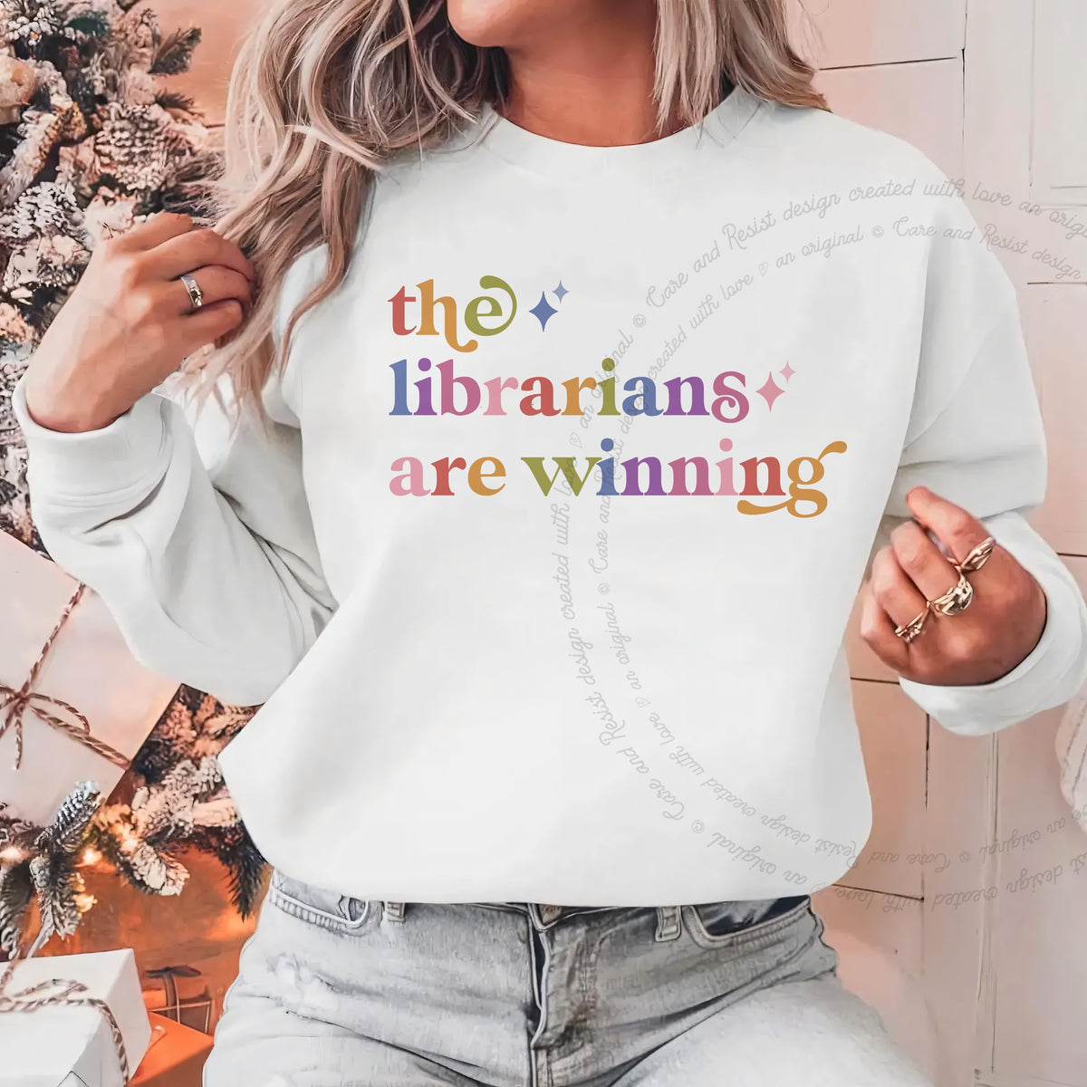 The Librarians are Winning Care & Resist Gildan crewneck sweatshirt in White