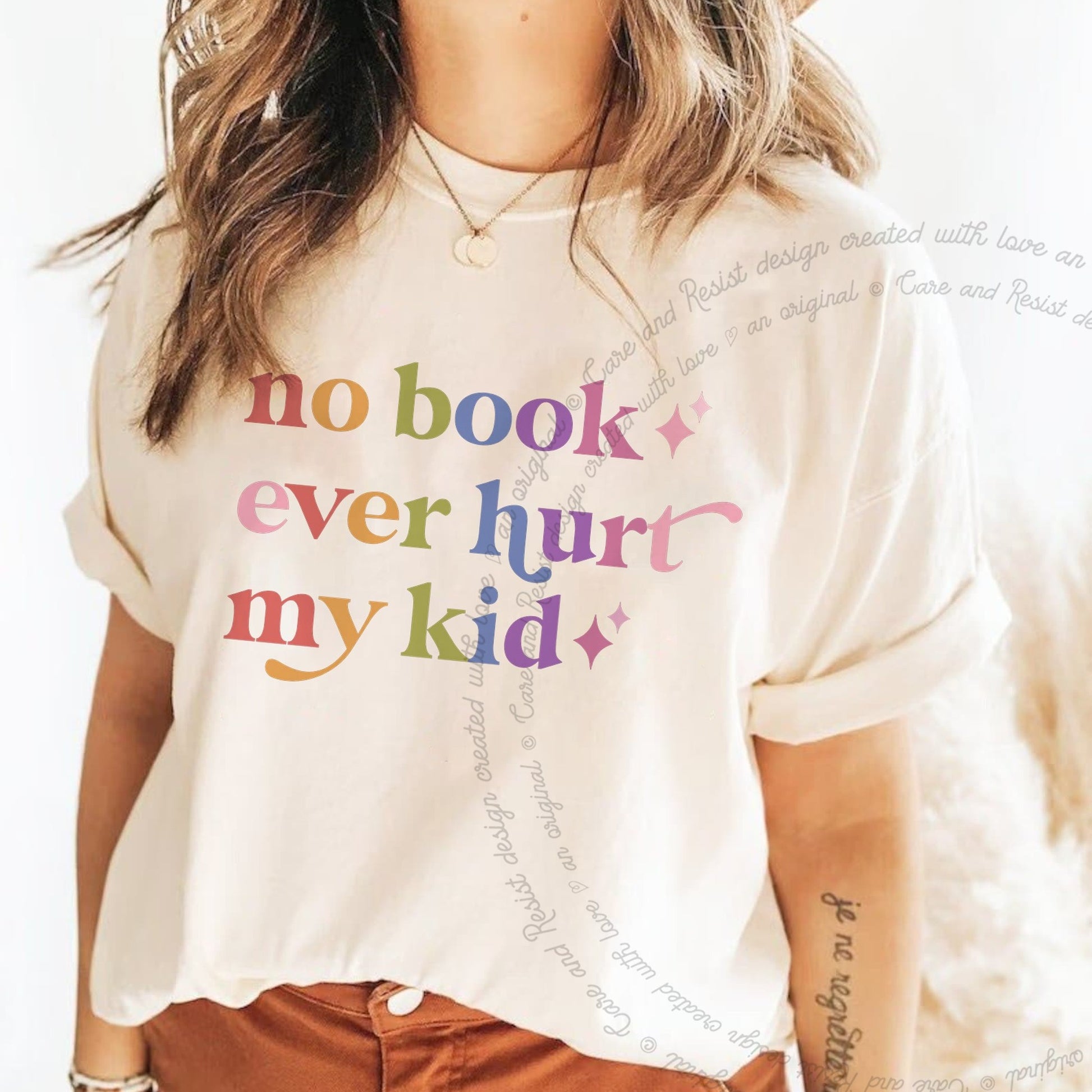No Book Ever Hurt My Kid Care & Resist rainbow tee