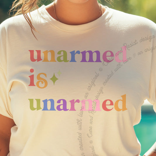 Unarmed is Unarmed Care & Resist progressive t-shirt in Ivory