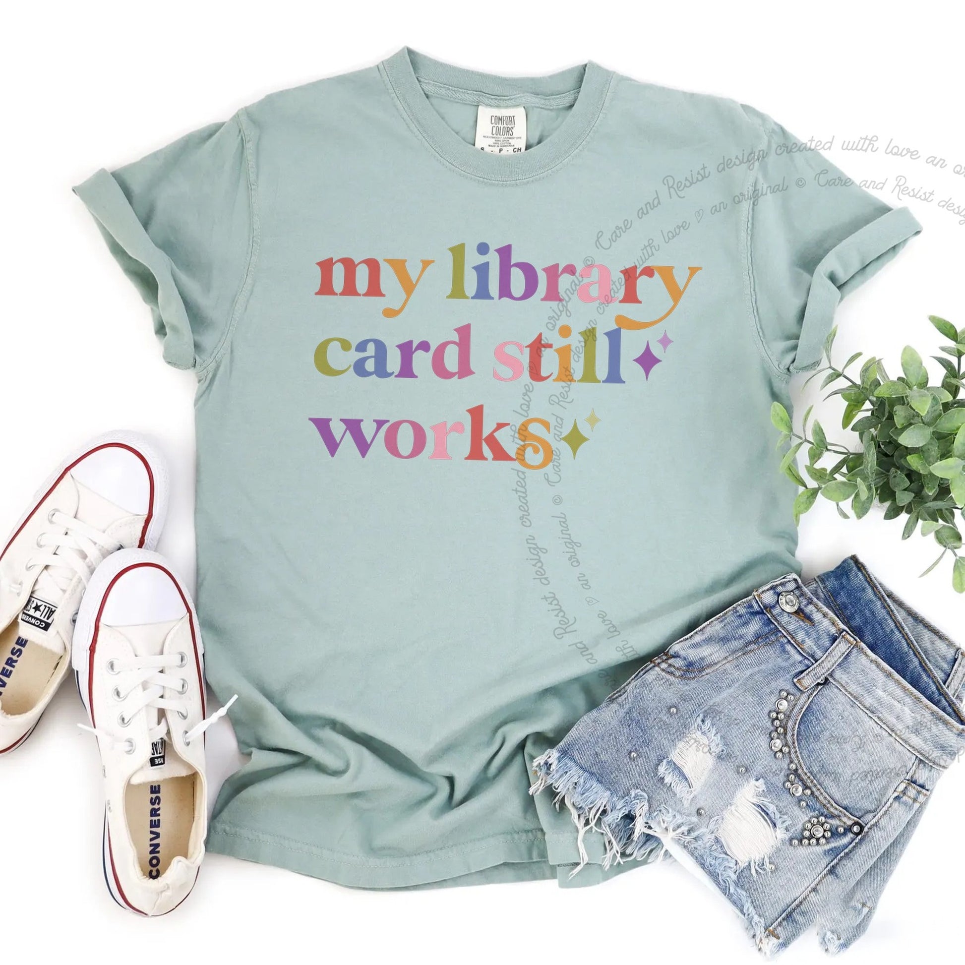 My Library Card Still Works Care & Resist rainbow Comfort Colors tee, Bay