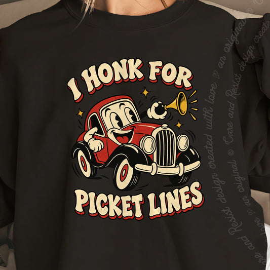 I Honk for Picket Lines Cartoon Care & Resist Gildan crewneck sweatshirt in Black