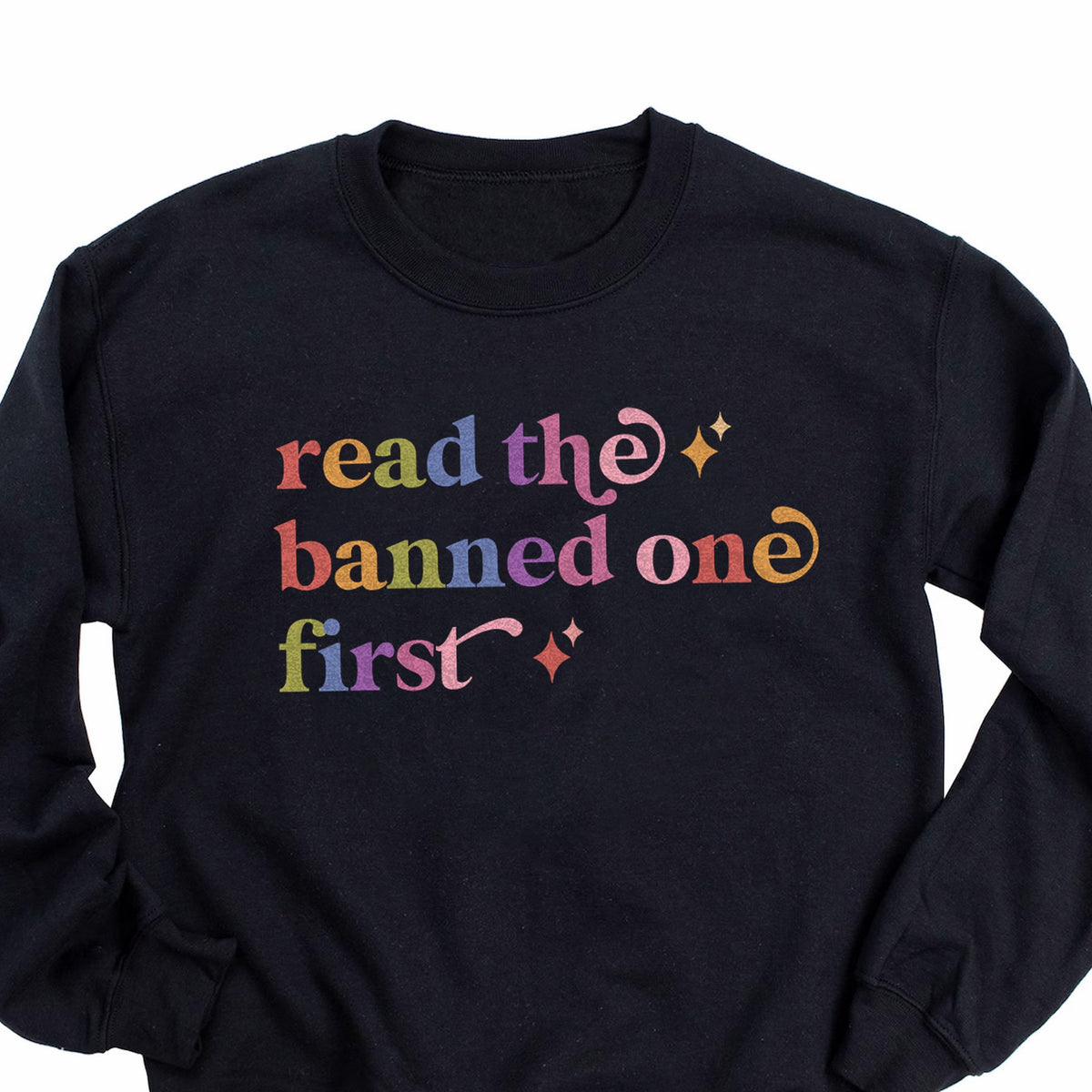 Read the Banned One First Care & Resist Gildan crewneck sweatshirt in Black