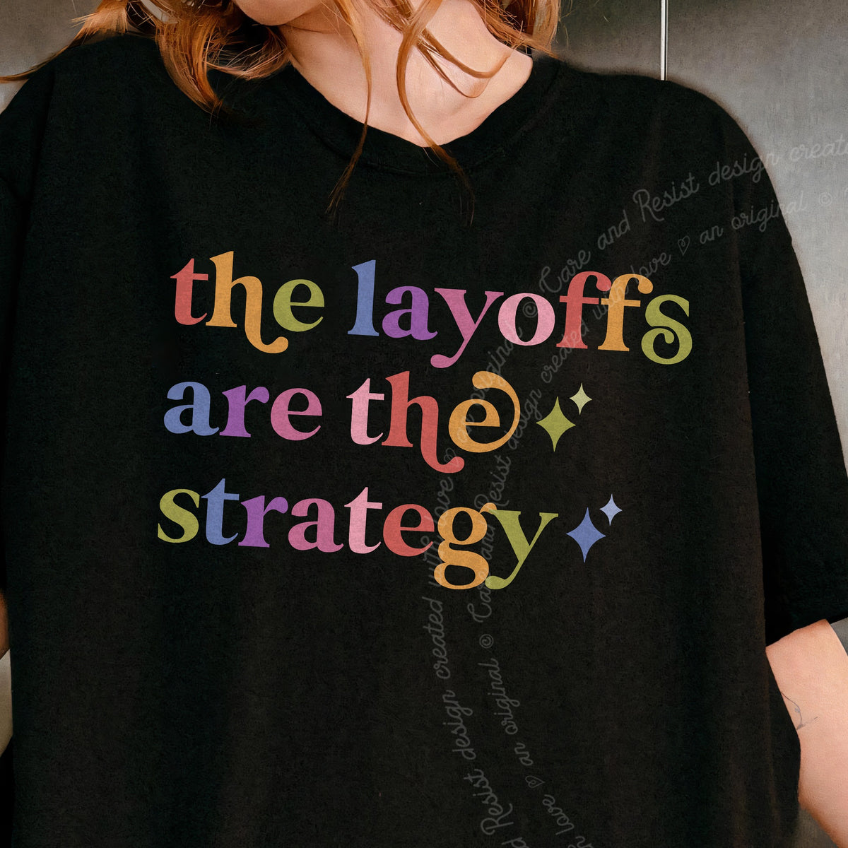 The Layoffs are the Strategy Care & Resist progressive t-shirt in Black