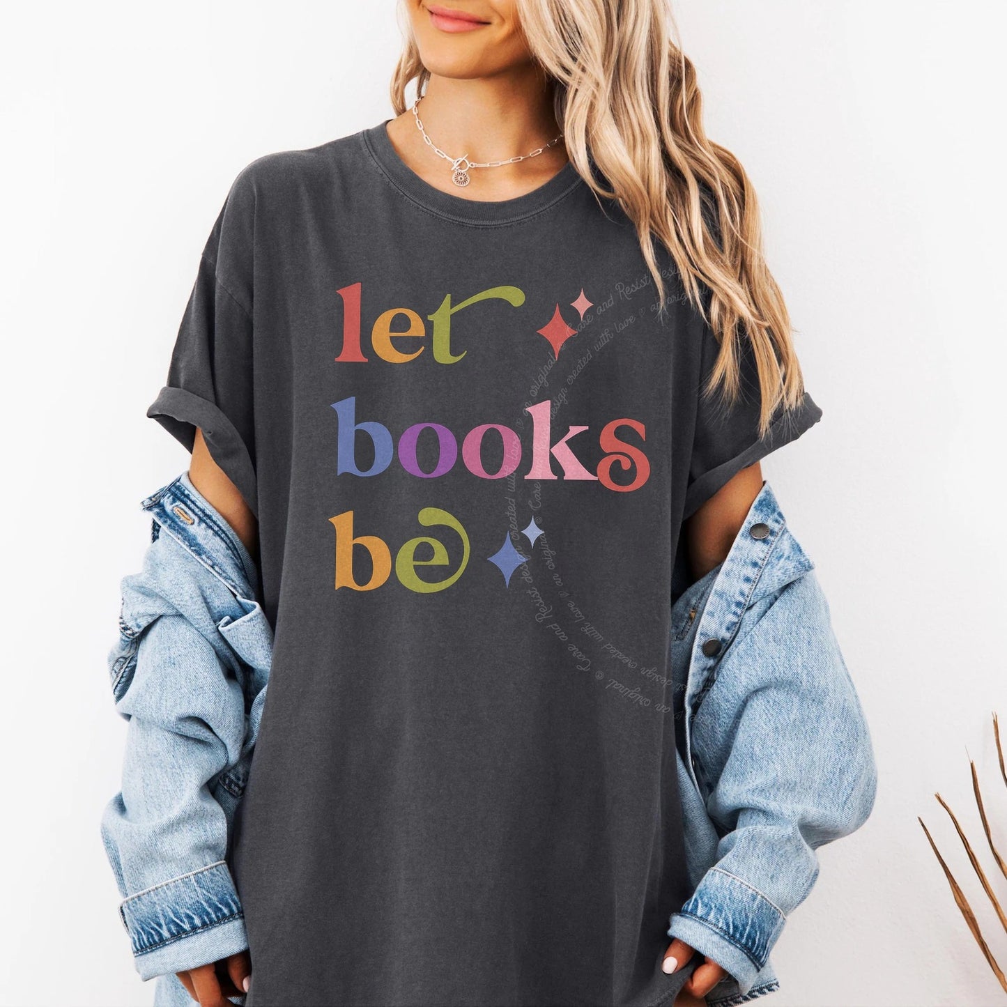 Let Books Be Care & Resist rainbow tee