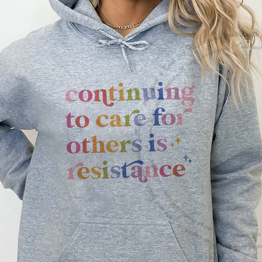 Continuing to Care for Others Is Resistance Care & Resist Gildan hoodie in Sport Grey