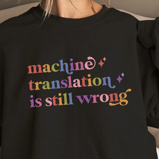 Machine Translation is Still Wrong Care & Resist Gildan crewneck sweatshirt in Black