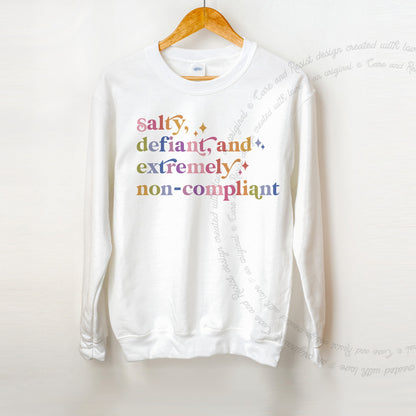 Salty, Defiant, and Extremely Non-compliant Care & Resist Gildan crewneck sweatshirt in White