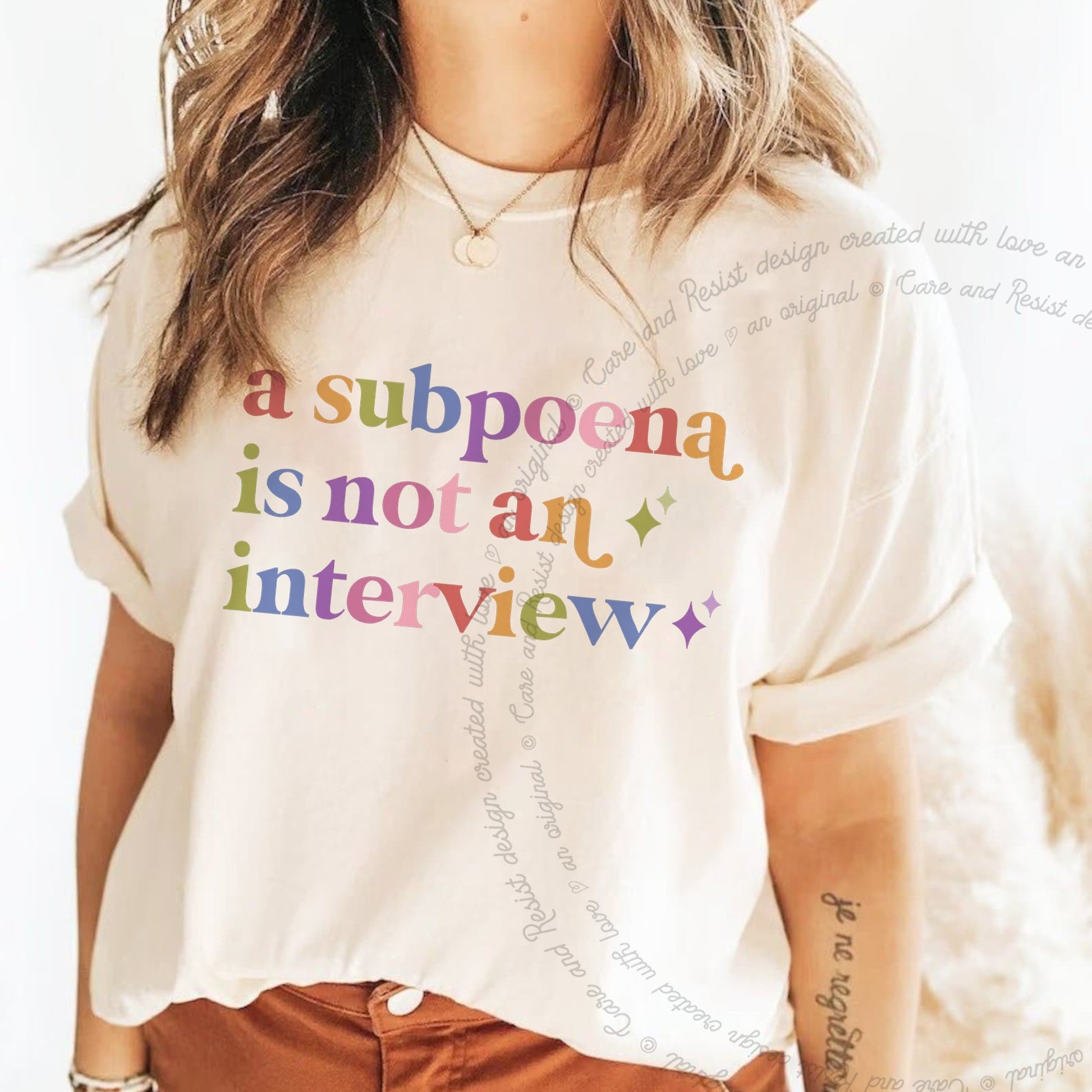 A Subpoena is not an Interview Care & Resist rainbow Comfort Colors tee, Ivory