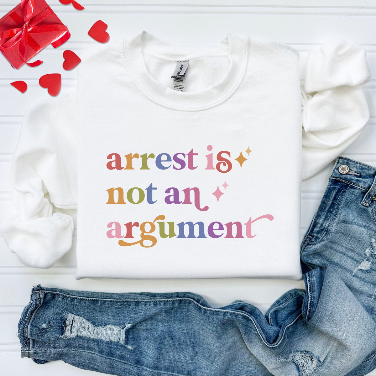 Arrest is not an Argument Care & Resist Gildan crewneck sweatshirt in White