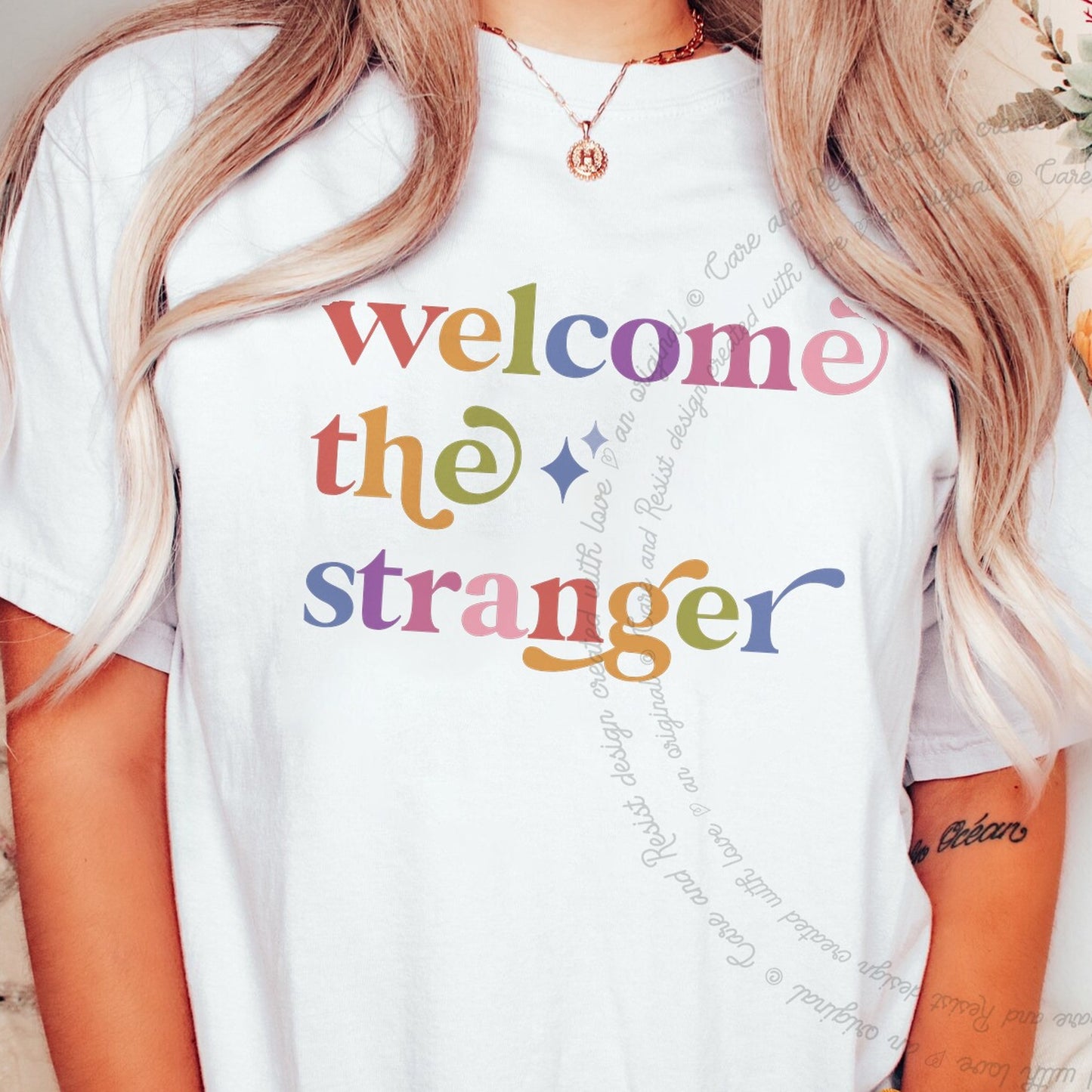 Welcome the Stranger Care & Resist rainbow Comfort Colors tee, White