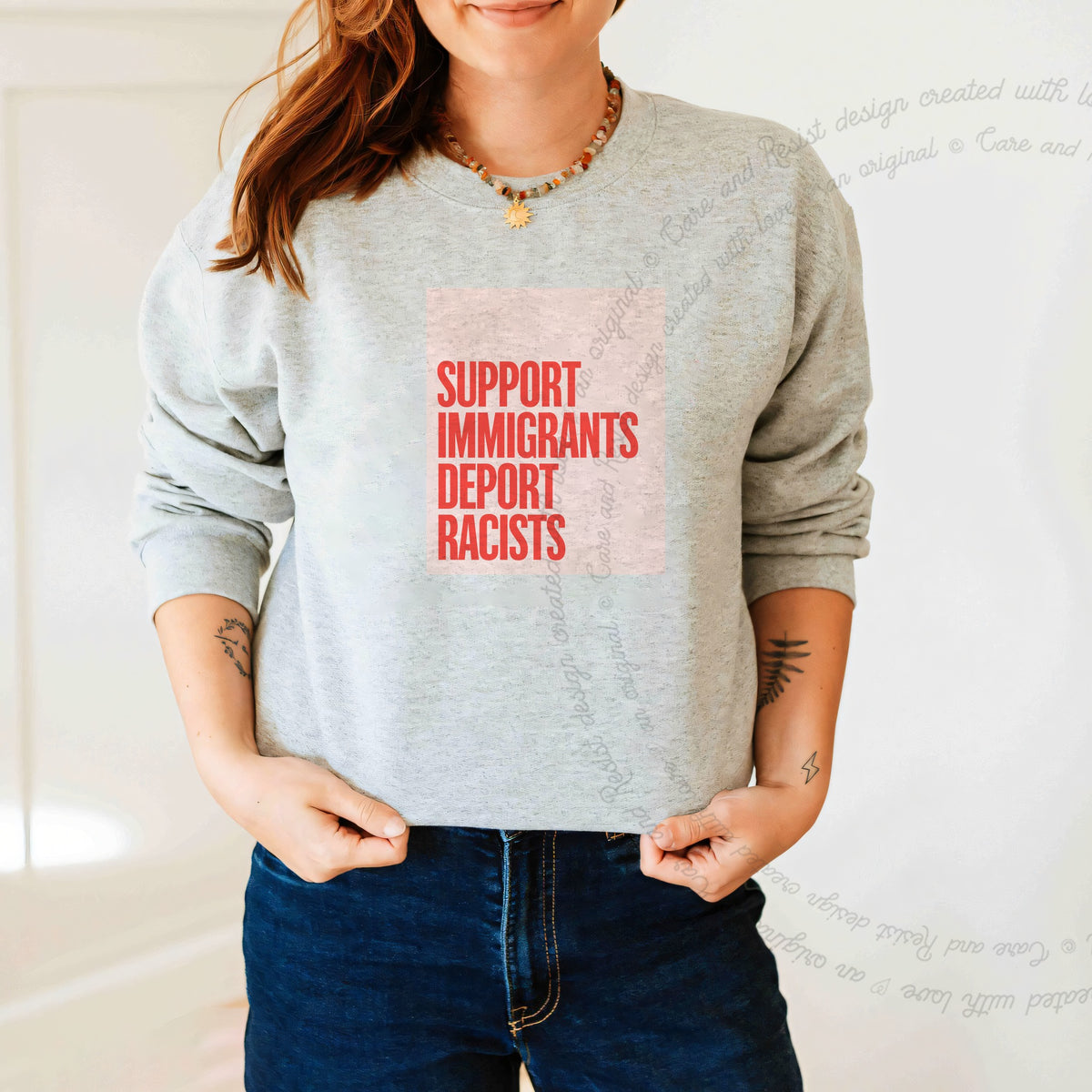 Support Immigrants Deport Racists Care & Resist Gildan crewneck sweatshirt in Sport Grey