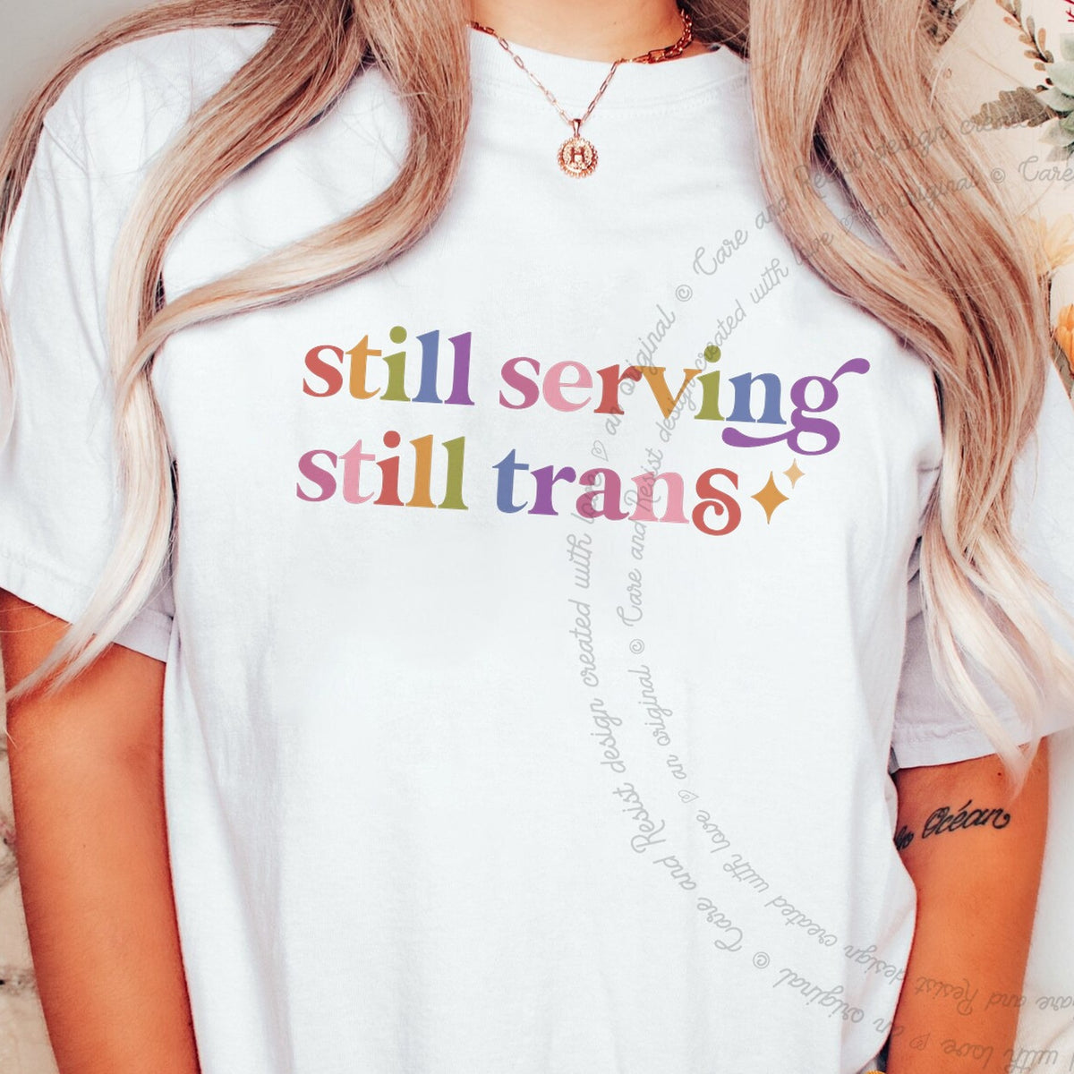 Still Serving Still Trans Care & Resist rainbow tee