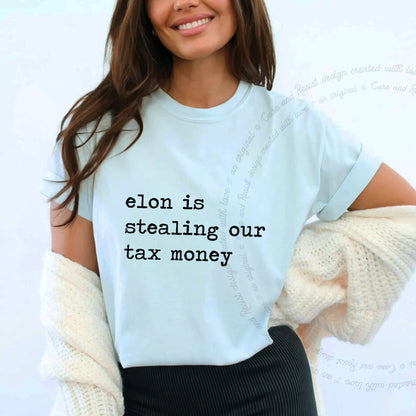 Elon Is Stealing Our Tax Money Care & Resist progressive t-shirt in Chambray